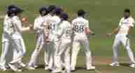 Indian team celebrating after taking wicket